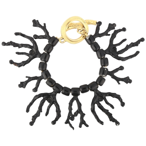 1110 - YVES SAINT LAURENT - a Vintage black enamel and rhinestone 'Coral' bracelet, designed by Robert Goos... 