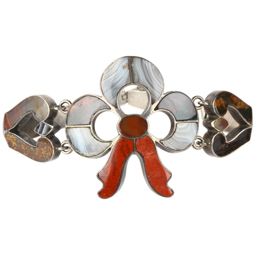 1117 - An Antique Scottish hardstone ribbon bow bracelet, circa 1880, apparently unmarked silver closed-bac... 