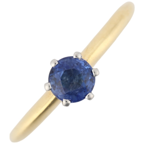 1119 - An 18ct gold solitaire sapphire ring, maker C&JS, London 1998, claw set with 0.5ct round-cut sapphir... 