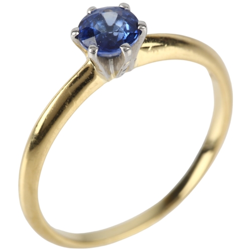 1119 - An 18ct gold solitaire sapphire ring, maker C&JS, London 1998, claw set with 0.5ct round-cut sapphir... 