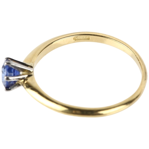 1119 - An 18ct gold solitaire sapphire ring, maker C&JS, London 1998, claw set with 0.5ct round-cut sapphir... 