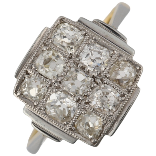 1123 - An 18ct gold nine stone diamond chequer board panel ring, circa 1910, pave set with old-cut diamonds... 