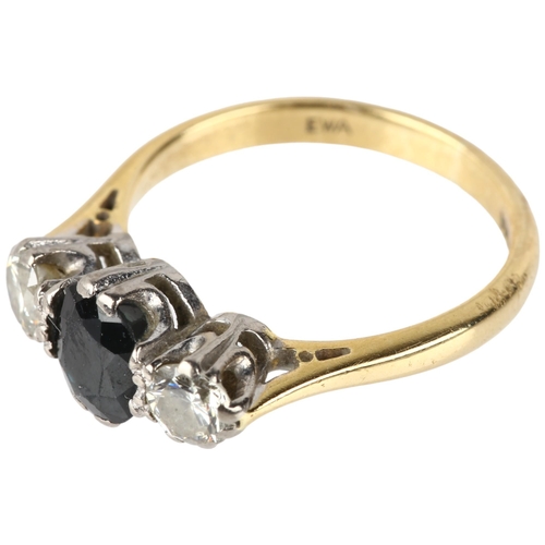 1125 - A late 20th century 18ct gold three stone sapphire and diamond ring, maker EWA, London 1974, claw se... 