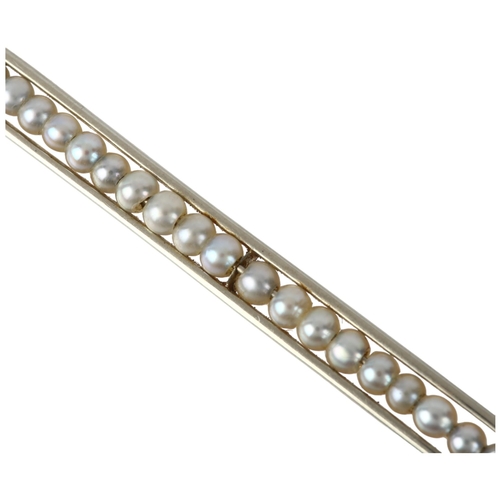 1127 - A French pearl line brooch, circa 1910, apparently unmarked,  39.9mm, 2.6g