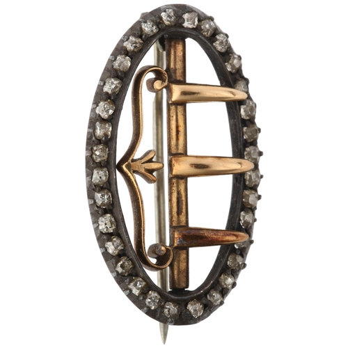 1135 - A Georgian silver and gold diamond buckle brooch, cut-down collet set with old-cut diamonds, 25mm, 3... 