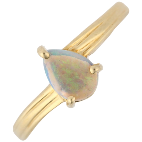 1136 - A modern 14ct gold solitaire opal ring, claw set with pear cabochon opal, opal measures approx 6.84 ... 