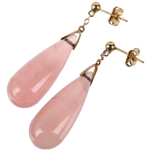 1145 - A pair of rose quartz drop earrings, each set with polished teardrop rose quartz, with unmarked rose... 