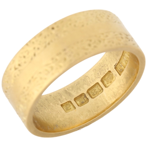 1147A - A mid-20th century 18ct gold wedding band ring, maker WW Ltd, London 1956, engraved foliate decorati... 