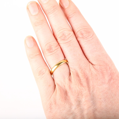 An early 20th century 22ct gold wedding band ring, maker AC Co ...