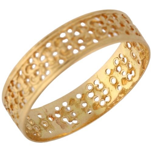 1152 - A Continental high carat gold wedding band ring, pierced floral decoration, band width 5mm, size M, ... 