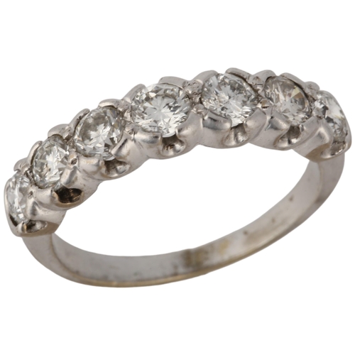 1158 - A modern 18ct white gold seven stone diamond ring, bezel set with modern round brilliant-cut diamond... 