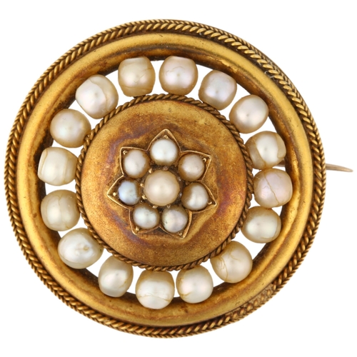 1159 - A Victorian whole pearl flowerhead cluster mourning brooch, circa 1880, circular form with central f... 