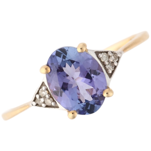 1161 - A modern 9ct gold tanzanite and diamond dress ring, claw set with oval mixed-cut tanzanite and singl... 