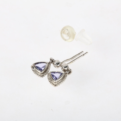 1163 - A pair of 9ct white gold tanzanite drop earrings, rub-over set with trillion-cut tanzanites, with st... 