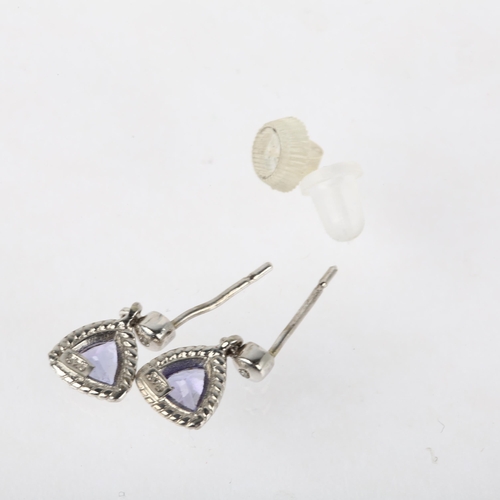 1163 - A pair of 9ct white gold tanzanite drop earrings, rub-over set with trillion-cut tanzanites, with st... 