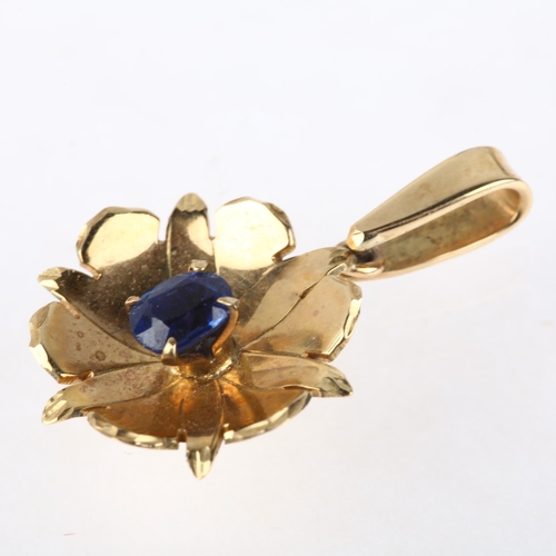 1166 - A late 20th century 9ct gold sapphire flowerhead drop pendant, maker WBS, London 1982, claw set with... 