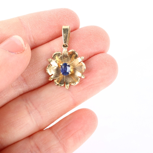 1166 - A late 20th century 9ct gold sapphire flowerhead drop pendant, maker WBS, London 1982, claw set with... 