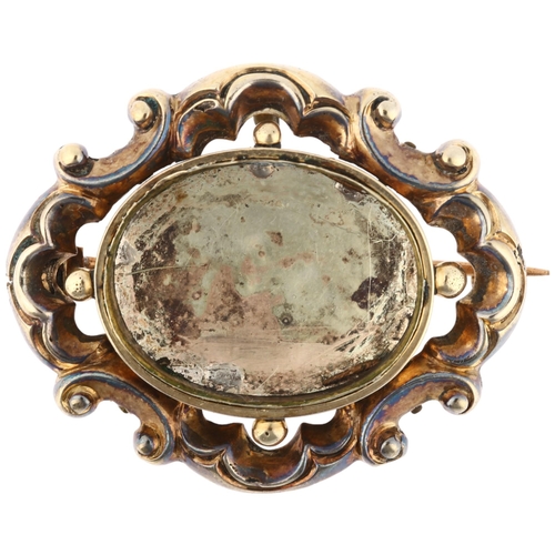 1168 - A 19th century mourning brooch frame, central vacant panel with foliate border and closed-back unmar... 