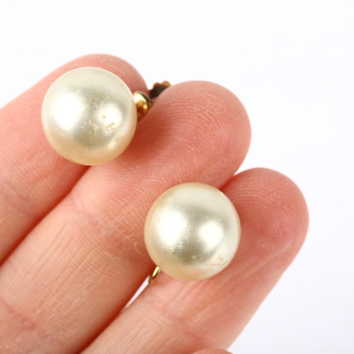 1169 - A pair of 9ct gold whole cultured pearl earrings, with screw-back fittings, 12mm pearls, 7.1g