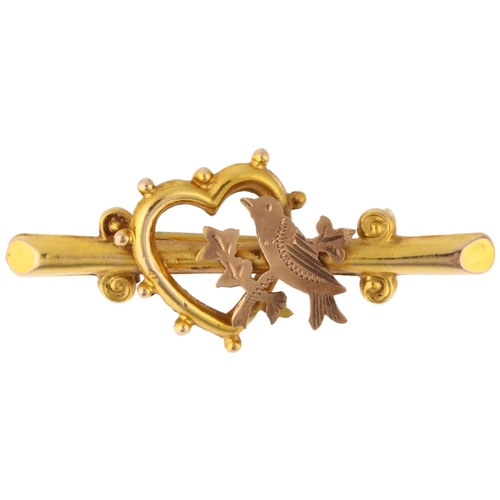 1172 - An Edwardian 9ct two-colour gold sweetheart bar brooch, circa 1905, with bird and heart motif, 34.5m... 