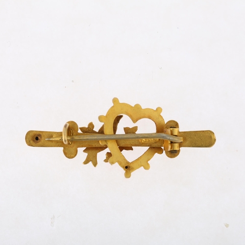 1172 - An Edwardian 9ct two-colour gold sweetheart bar brooch, circa 1905, with bird and heart motif, 34.5m... 