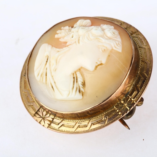 1173 - A 19th century 9ct rose gold shell cameo brooch, relief carved depicting Classical female profile, 3... 