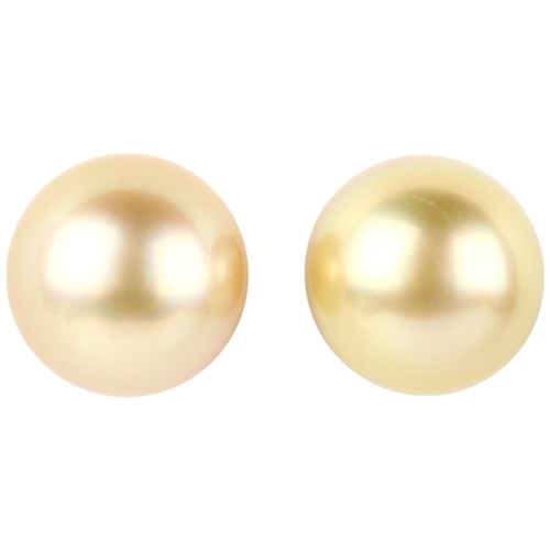 1174 - A pair of 18ct gold whole South Sea pearl earrings, with stud fittings, 10.4mm pearls, 4.1g