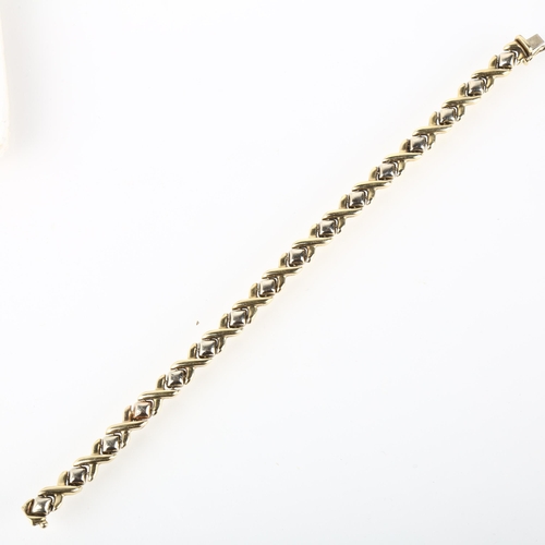 1177 - A late 20th century 9ct gold XO link chain bracelet, maker PM, import London 1995, band width 7.6mm,... 