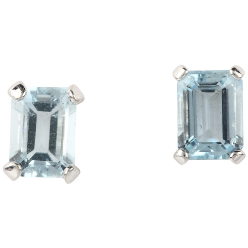 1181 - A pair of aquamarine earrings, each claw set with 1ct octagonal step-cut aquamarine, unmarked white ... 