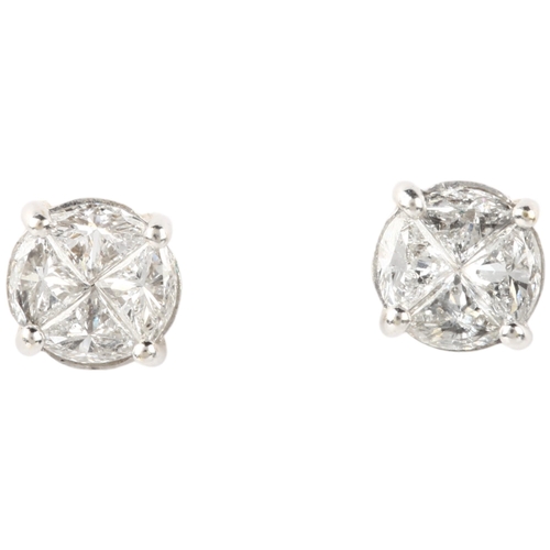 1182 - A pair of 18ct gold four stone diamond circular cluster earrings, each claw set with 4 triangular se... 