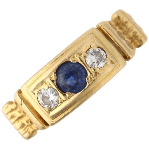 1183 - A late 20th century 18ct gold three stone sapphire and diamond ring, maker ARW, London 1984, setting... 