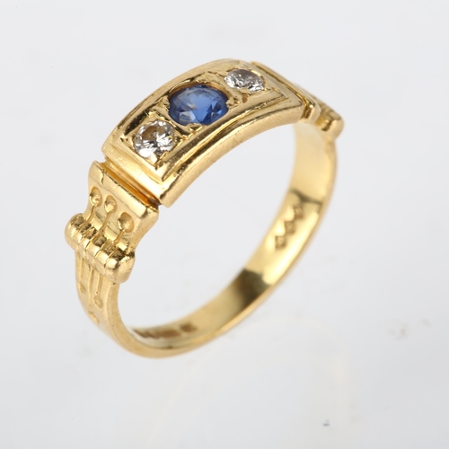 1183 - A late 20th century 18ct gold three stone sapphire and diamond ring, maker ARW, London 1984, setting... 