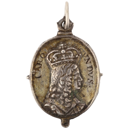 1186 - A Charles II (r.1660-1685), Royalist badge pendant, by Thomas Rawlins, crowned bust right, carolvs s... 