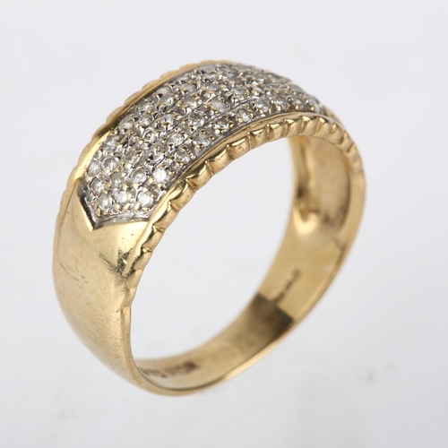 1187 - A modern 9ct gold diamond cluster band ring, pave set with modern round brilliant-cut diamonds, tota... 