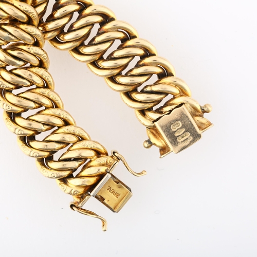 1194 - A late 20th century 9ct gold hollow double curb link chain bracelet, by Unoaerre, import London 1991... 