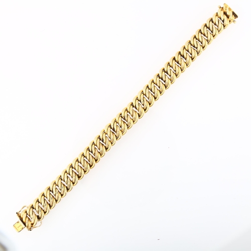 1194 - A late 20th century 9ct gold hollow double curb link chain bracelet, by Unoaerre, import London 1991... 