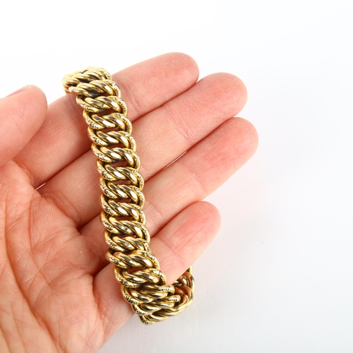 1194 - A late 20th century 9ct gold hollow double curb link chain bracelet, by Unoaerre, import London 1991... 