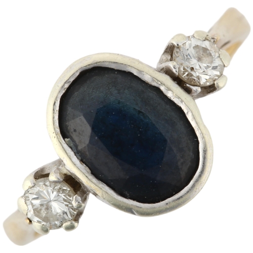 1196 - A late 20th century 9ct gold three stone sapphire and diamond ring, London 1992, rub-over set with 2... 