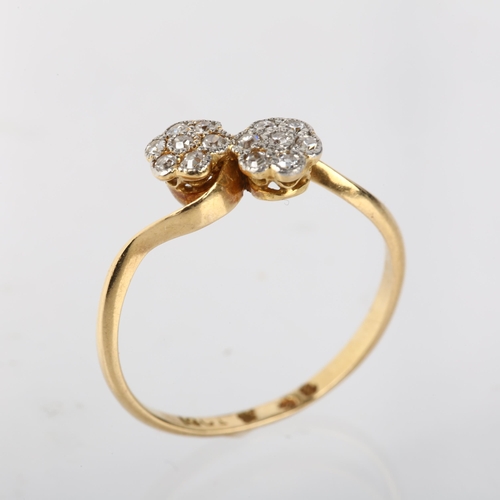 1200 - An early 20th century 18ct gold diamond double flowerhead cluster ring, set with single-cut diamonds... 