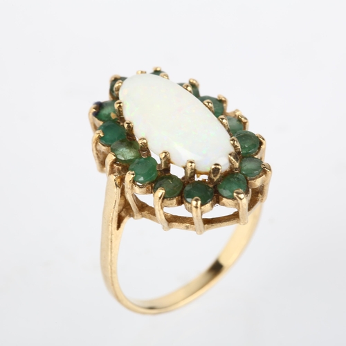 1202 - A late 20th century 9ct gold opal and emerald oval cluster ring, maker RJ, London 1976, claw set wit... 