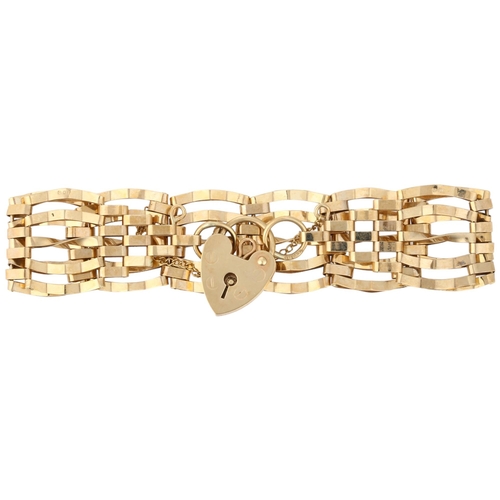 1211 - A 9ct gold gatelink bracelet, London 1978, with 9ct heart padlock clasp, 18cm, 10.9g