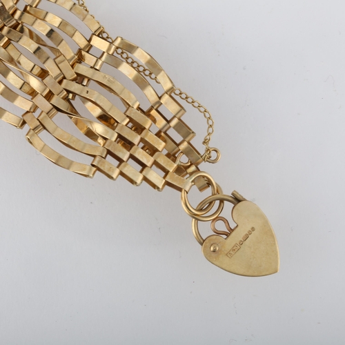 1211 - A 9ct gold gatelink bracelet, London 1978, with 9ct heart padlock clasp, 18cm, 10.9g