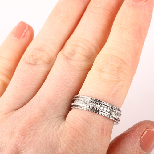 1221 - A modern 18ct white gold diamond three quarter eternity band ring, set with modern round brilliant-c... 