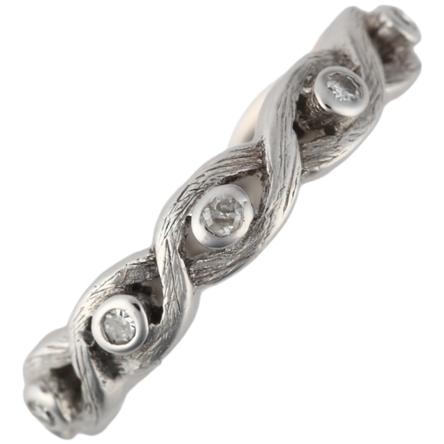 1224 - An 18ct white gold diamond full eternity ring, rub-over set with single-cut diamonds and woven band,... 