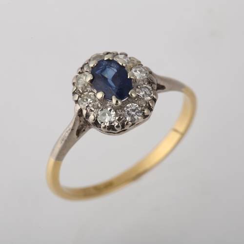 1232 - An 18ct gold sapphire and diamond oval cluster ring, claw set with oval mixed-cut sapphire and singl... 