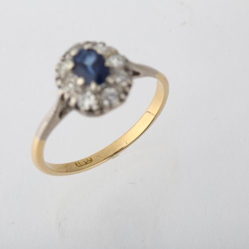 1232 - An 18ct gold sapphire and diamond oval cluster ring, claw set with oval mixed-cut sapphire and singl... 