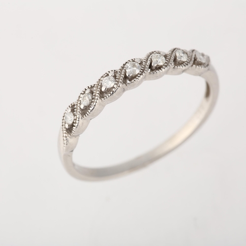 1235 - A modern 9ct white gold diamond half eternity ring, set with modern round brilliant-cut diamonds, se... 