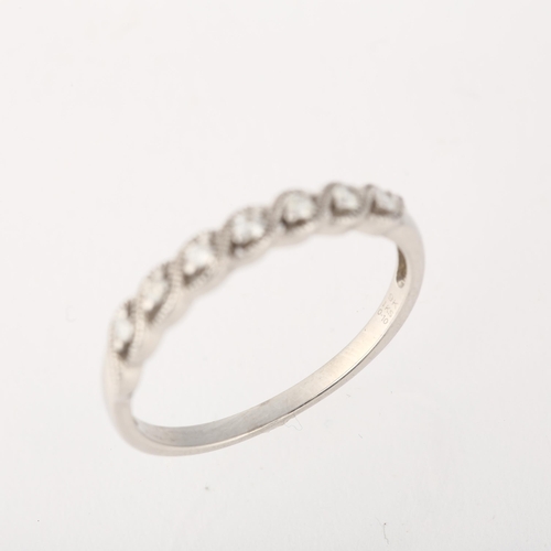 1235 - A modern 9ct white gold diamond half eternity ring, set with modern round brilliant-cut diamonds, se... 