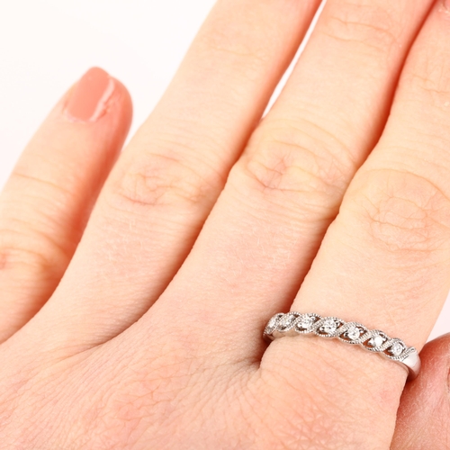 1235 - A modern 9ct white gold diamond half eternity ring, set with modern round brilliant-cut diamonds, se... 