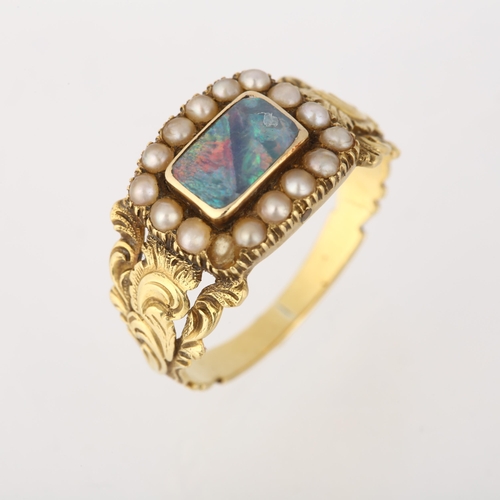 1248 - A Georgian opal doublet? and split pearl cluster mourning ring, circa 1820, the central panel with o... 